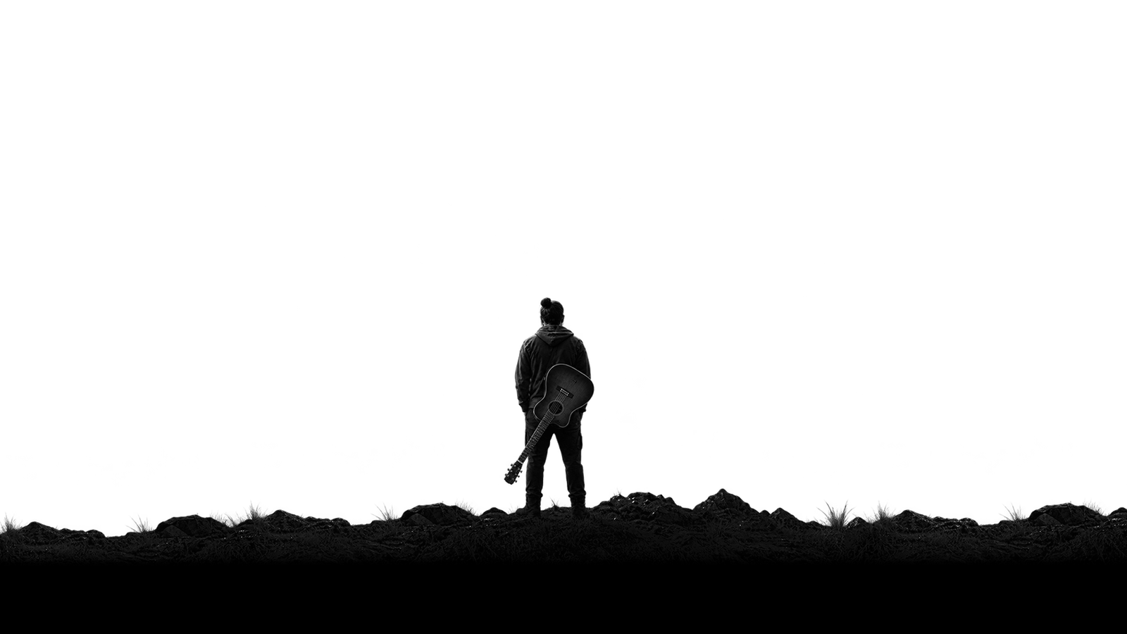 Silhouette against a dark horizon